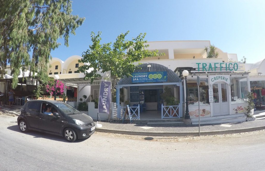 Eco Cleaners Laundry Spa storefront in Kamari, Santorini, Greece